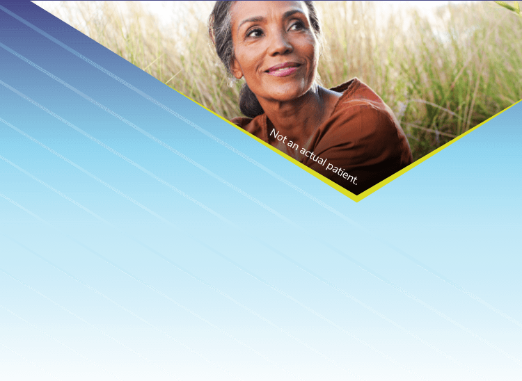 Woman smiling in a field